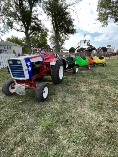 The barrel train, a tractor pulling painted barrel cars
