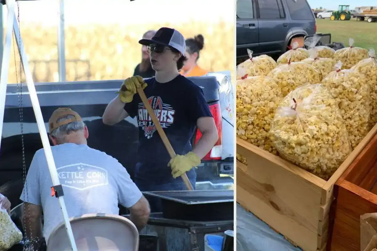 The kettle corn stand: the kettle being worked, and bags stacked in a crate