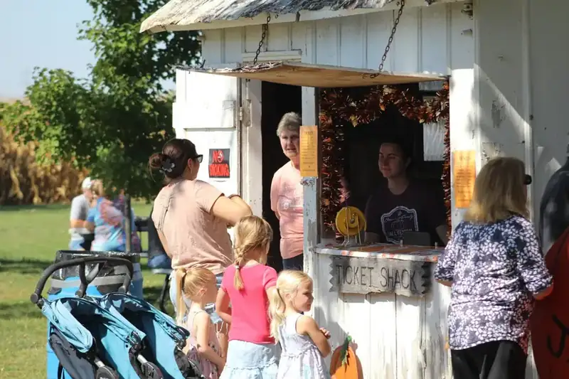 Families lined up at the Ticket Shack